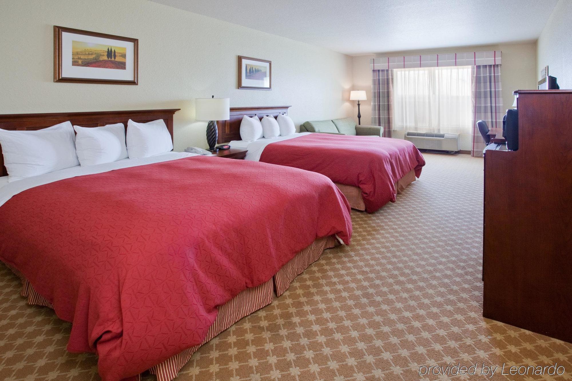 Clarion Pointe Columbus-Bradley Park Hotell Rum bild