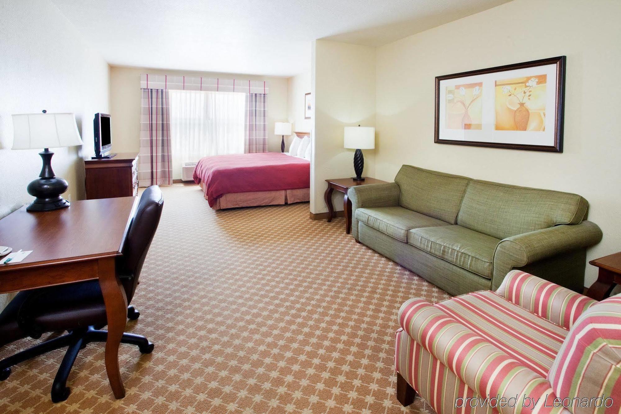 Clarion Pointe Columbus-Bradley Park Hotell Rum bild
